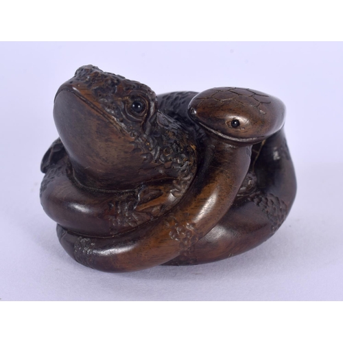 1531 - A JAPANESE CARVED BOXWOOD SNAKE AND TOAD NETSUKE. 3.5 cm x 3.5 cm.