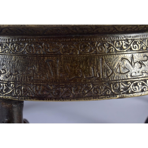 1547 - A 12TH / 13TH CENTURY PERSIAN INSCRIBED SIX FOOT BRONZE CENSER  the body incised with a multitude of... 