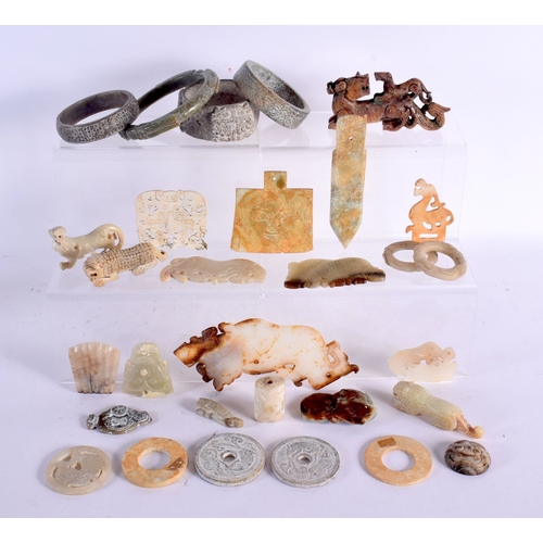572 - A GOOD COLLECTION OF CHINESE ARCHAIC JADE CARVINGS Warring States and Later, including plaques, bang... 