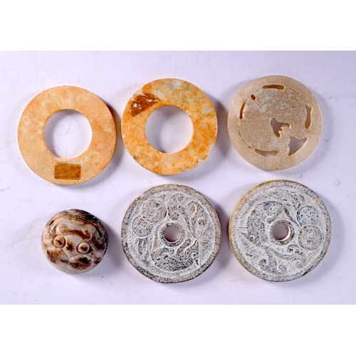 572 - A GOOD COLLECTION OF CHINESE ARCHAIC JADE CARVINGS Warring States and Later, including plaques, bang... 