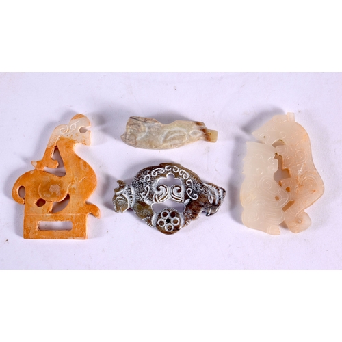572 - A GOOD COLLECTION OF CHINESE ARCHAIC JADE CARVINGS Warring States and Later, including plaques, bang... 