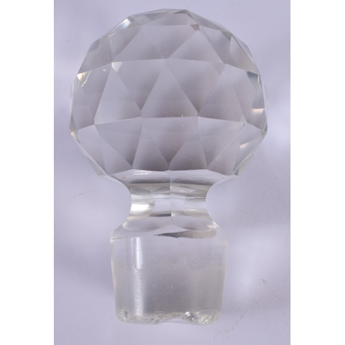 587 - AN UNUSUAL BETJEMENS PATENT SINGLE CUT GLASS DECANTER. 24 cm high.