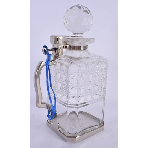 587 - AN UNUSUAL BETJEMENS PATENT SINGLE CUT GLASS DECANTER. 24 cm high.