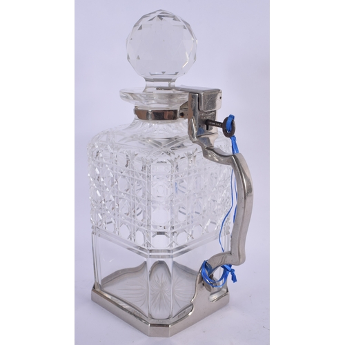 587 - AN UNUSUAL BETJEMENS PATENT SINGLE CUT GLASS DECANTER. 24 cm high.