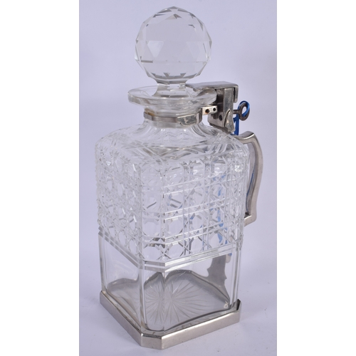 587 - AN UNUSUAL BETJEMENS PATENT SINGLE CUT GLASS DECANTER. 24 cm high.