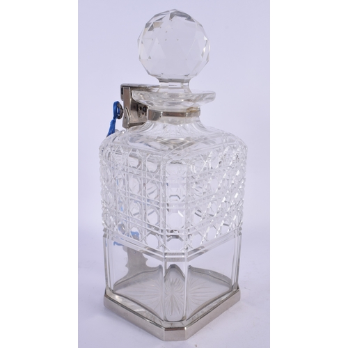 587 - AN UNUSUAL BETJEMENS PATENT SINGLE CUT GLASS DECANTER. 24 cm high.