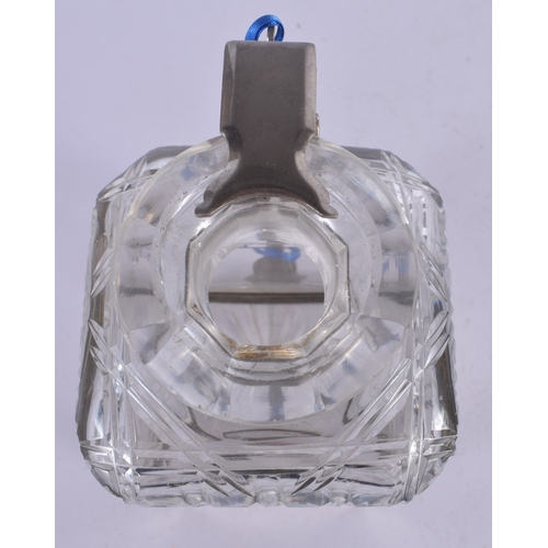 587 - AN UNUSUAL BETJEMENS PATENT SINGLE CUT GLASS DECANTER. 24 cm high.