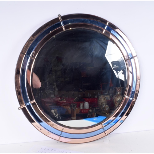 3137 - A LARGE ART DECO MIRROR. 76 cm diameter.