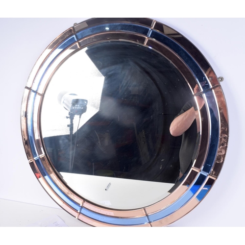 3137 - A LARGE ART DECO MIRROR. 76 cm diameter.