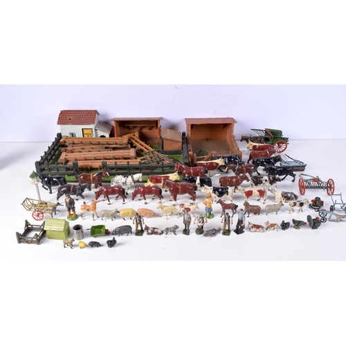 3677 - A vintage child's farm yard set with wooden buildings and a large collection of painted lead animals