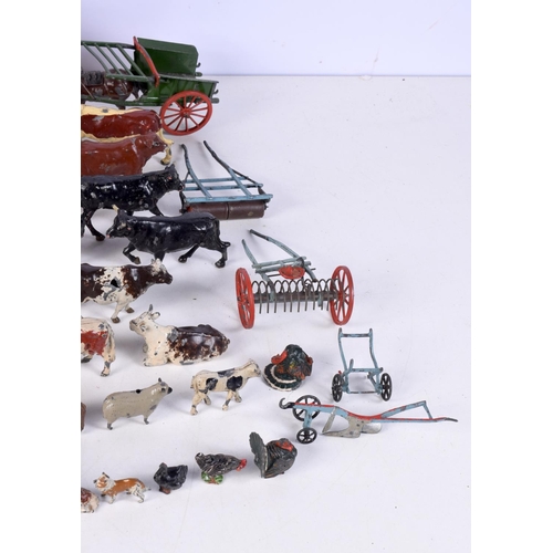 3677 - A vintage child's farm yard set with wooden buildings and a large collection of painted lead animals