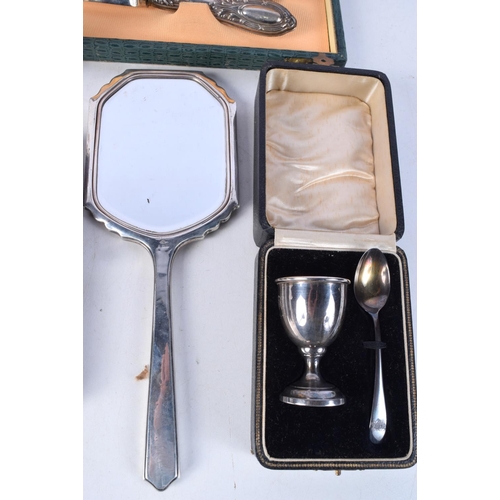 3767 - A collection of silver and plated items Egg cup and spoons, mirror etc (5)