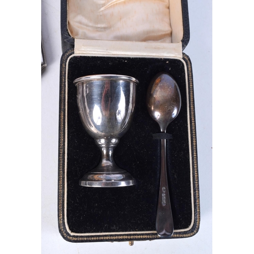 3767 - A collection of silver and plated items Egg cup and spoons, mirror etc (5)