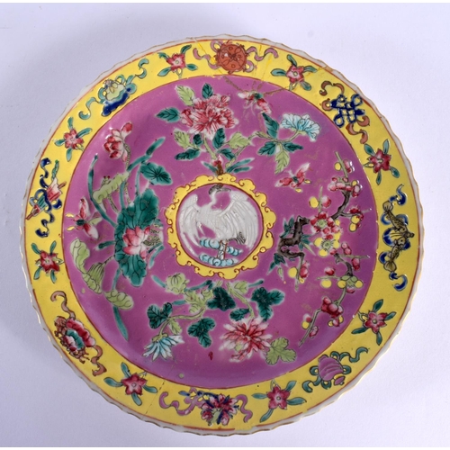 100 - A LATE 19TH CENTURY CHINESE FAMILLE ROSE STRAITS PORCELAIN PLATE together with a blue vase and cover... 