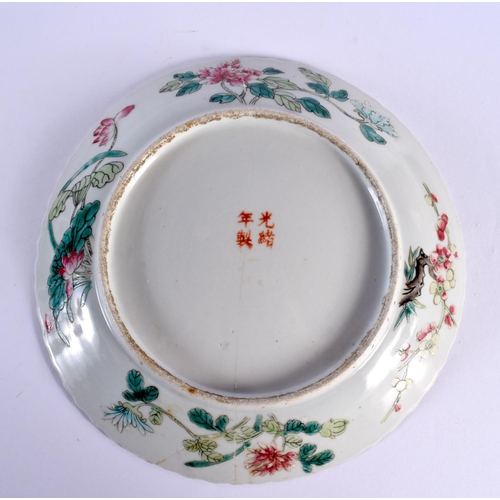 100 - A LATE 19TH CENTURY CHINESE FAMILLE ROSE STRAITS PORCELAIN PLATE together with a blue vase and cover... 