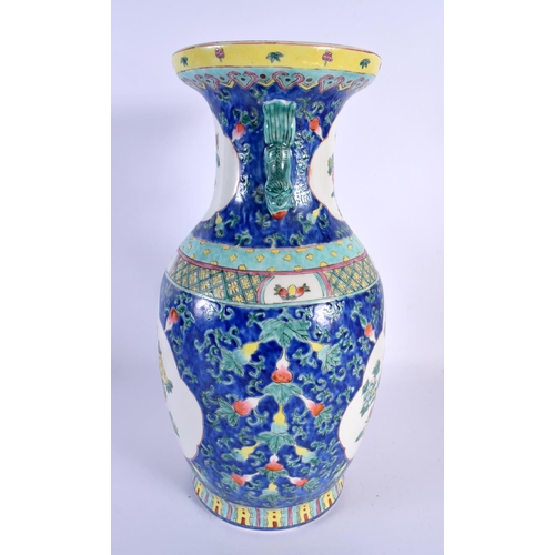 105 - A LARGE CHINESE REPUBLICAN PERIOD TWIN HANDLED PORCELAIN VASE decorated with foliage. 38 cm x 18 cm.