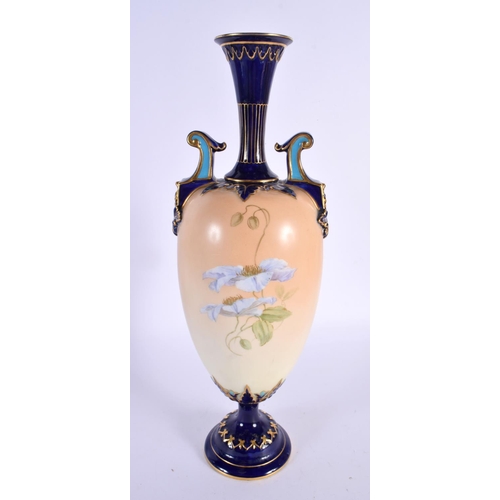 106 - A LARGE ROYAL WORCESTER TWIN HANDLED PORCELAIN VASE. 33 cm high.