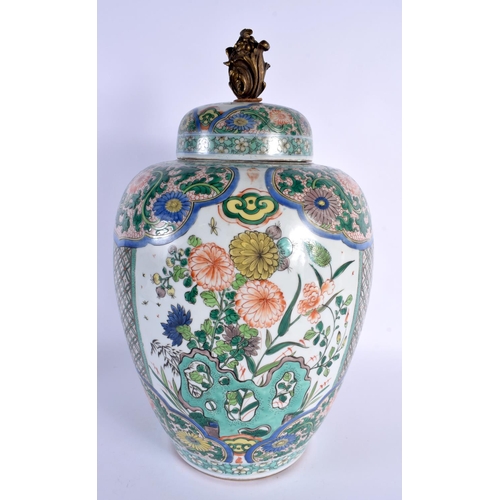 112 - A LARGE 19TH CENTURY FRENCH SAMSONS OF PARIS FAMILLE VERTE VASE AND COVER painted in the Kangxi styl... 