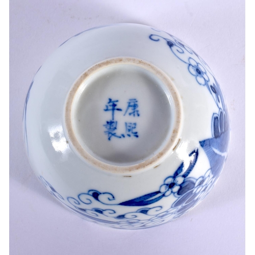 117 - A SMALL 19TH CENTURY CHINESE BLUE AND WHITE PORCELAIN BOWL bearing Kangxi marks to base. 9.5 cm diam... 