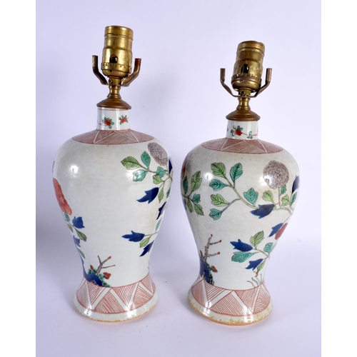 119 - A PAIR OF 19TH CENTURY FRENCH SAMSONS OF PARIS PORCELAIN LAMPS painted in the Kangxi style. 34 cm hi... 