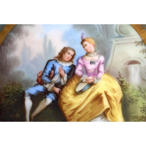 121 - A 19TH CENTURY FRENCH SEVRES PORCELAIN PLAQUE painted with lovers in landscapes. 16 cm diameter.