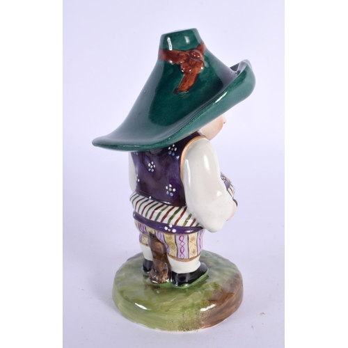 123 - A 19TH CENTURY CONTINENTAL MANSION DWARF PORCELAIN FIGURE Derby style. 15 cm high.