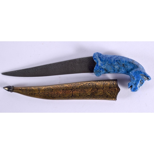 139 - A MIDDLE EASTERN ISLAMIC LAPIS LAZULI KNIFE with engraved iron scabbard. 18 cm long.