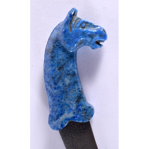 139 - A MIDDLE EASTERN ISLAMIC LAPIS LAZULI KNIFE with engraved iron scabbard. 18 cm long.