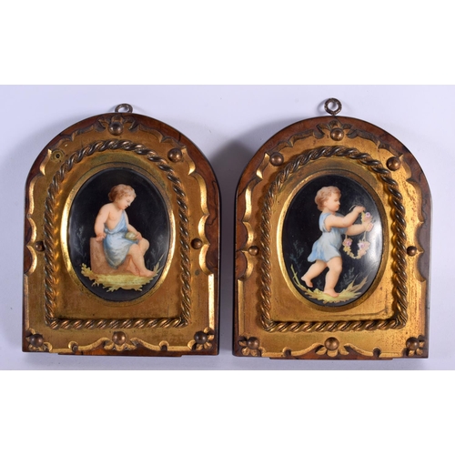 140 - A PAIR OF 19TH CENTURY EUROPEAN PORCELAIN PLAQUES mounted in bronze. 14 cm x 12 cm.