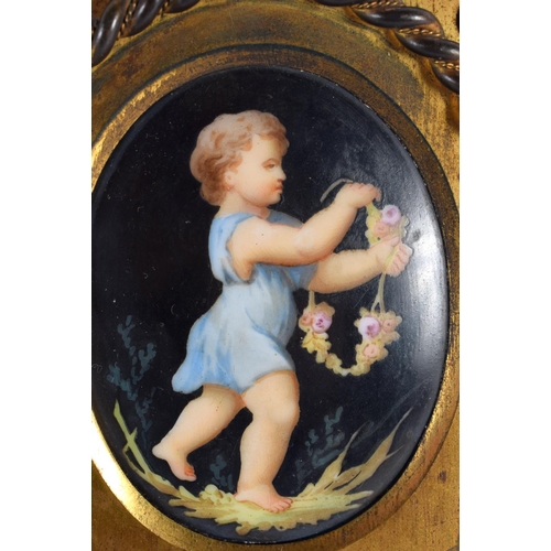 140 - A PAIR OF 19TH CENTURY EUROPEAN PORCELAIN PLAQUES mounted in bronze. 14 cm x 12 cm.