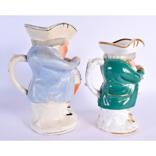 26 - TWO LARGE 19TH CENTURY STAFFORDSHIRE POTTERY CHARACTER JUGS. Largest 25 cm high. (2)