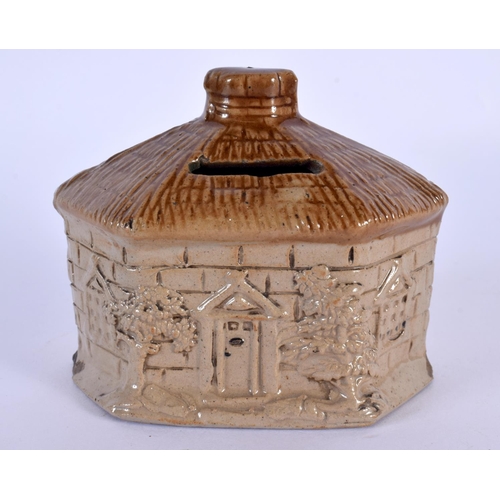 31 - A CHARMING MID 19TH CENTURY ENGLISH SALT GLAZED POTTERY MONEY BOX formed as a cottage. 12 cm x 10 cm... 