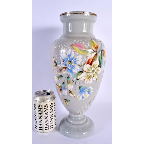 40 - A LARGE VICTORIAN OPALINE ENAMELLED GLASS VASE painted with flowers. 33 cm x 15 cm.