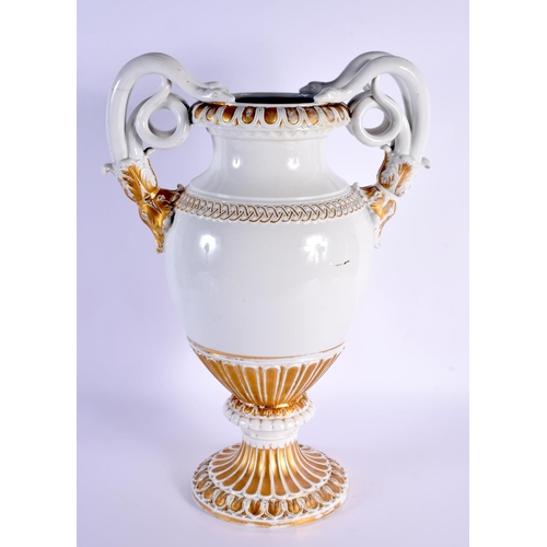 45 - A LARGE 19TH CENTURY MEISSEN PORCELAIN TWIN HANDLED COUNTRY HOUSE VASE modelled with serpent handles... 