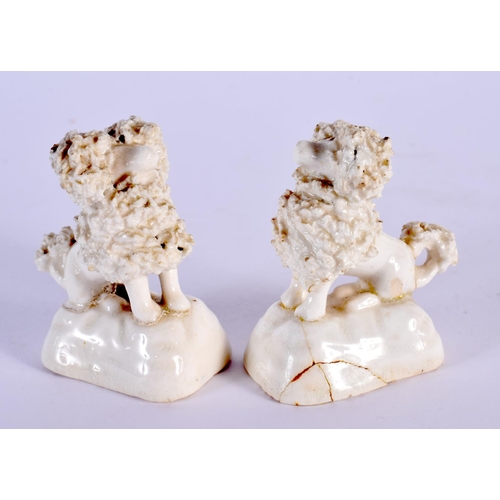 48 - A RARE PAIR OF 19TH CENTURY MINIATURE STAFFORDSHIRE POODLES. 5.5 cm high.