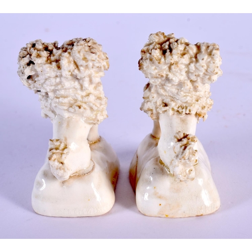 48 - A RARE PAIR OF 19TH CENTURY MINIATURE STAFFORDSHIRE POODLES. 5.5 cm high.