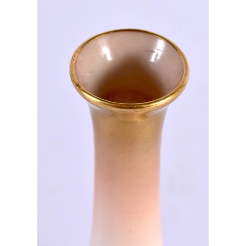 65 - A ROYAL WORCESTER PORCELAIN ROSE VASE with slender neck. 14 cm high.