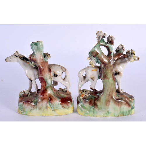 67 - AN EXTREMELY RARE PAIR OF 19TH CENTURY MINIATURE STAFFORDSHIRE HORSE SPILL VASES of naturalistic for... 