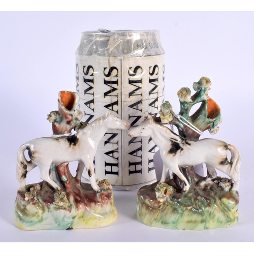 67 - AN EXTREMELY RARE PAIR OF 19TH CENTURY MINIATURE STAFFORDSHIRE HORSE SPILL VASES of naturalistic for... 