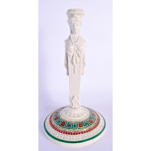 72 - A 19TH CENTURY ENGLISH EGYPTIAN REVIVAL PORCELAIN CANDLESTICK formed as a figure. 22 cm high.