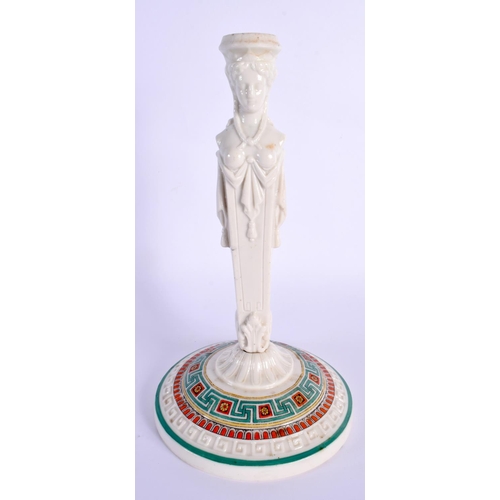 72 - A 19TH CENTURY ENGLISH EGYPTIAN REVIVAL PORCELAIN CANDLESTICK formed as a figure. 22 cm high.