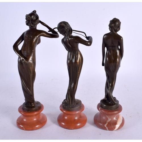 749B - A SET OF THREE CONTEMPORARY BRONZES. 22 cm high. (3)