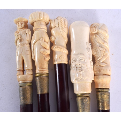 749 - FIVE CONTEMPORARY CARVED BONE WALKING CANES. 90 cm long. (5)