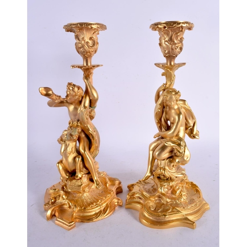 749E - A PAIR OF CONTEMPORARY GILT BRONZE CANDLESTICKS. 30 cm high.