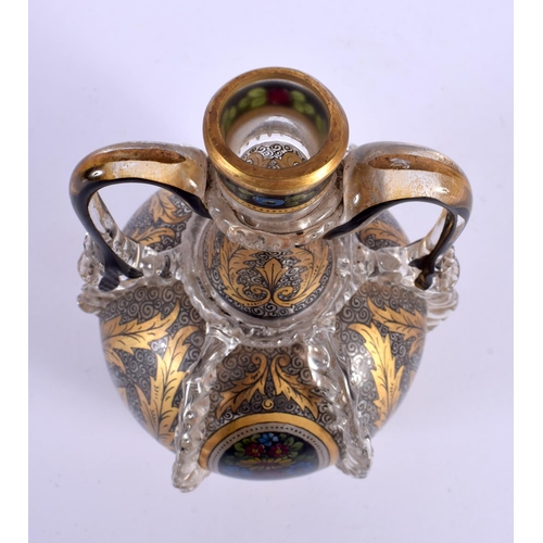 77 - AN ANTIQUE TWIN HANDLED ENAMELLED GLASS VASE possibly Austrian or German. 17 cm x 10 cm.