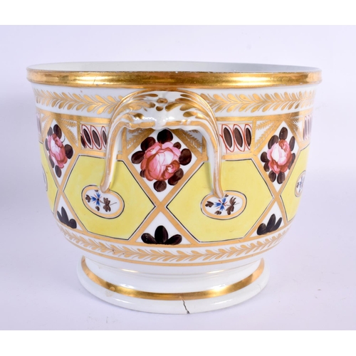 90 - A LARGE EARLY 19TH CENTURY COALPORT TWIN HANDLED PORCELAIN JARDINIERE painted with flowers. 23 cm x ... 