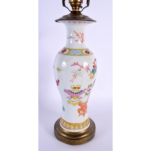 99 - AN EARLY 20TH CENTURY CHINESE FAMILLE ROSE PORCELAIN LAMP Guangxu. 50 cm high.