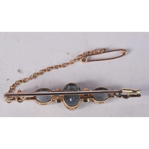 760D - A GOLD BAR BROOCH MOUNTED WITH AQUAMARINE AND SEED PEARLS IN A FITTED CASE.  4.9cm x 1cm, weight 6.1... 