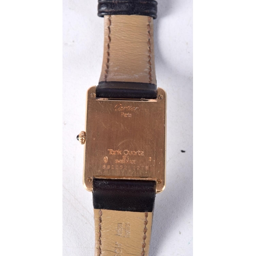 763 - AN 18CT GOLD CARTIER TANK QUARTZ CARTIER SMALL LEATHER STRAP WATCH.  Stamped 18K, Dial 2.4cm incl cr... 