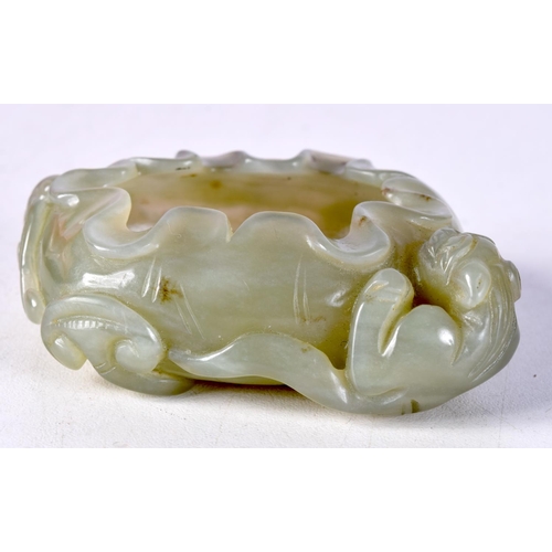 765C - A CHINESE GREEN JADE BRUSH WASHER DECORATED WITH CREATURES.  6.8cm x 5.7cm x 2.4cm